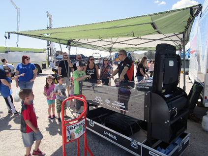 families using the trailer demonstrator at a touch a truck event