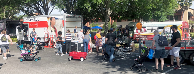 families attending a touch a truck event