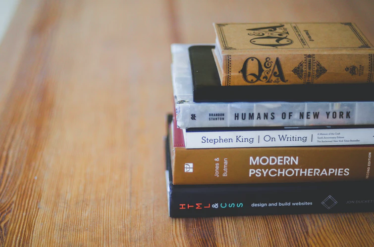 Add textbooks to your essential packing list for college.