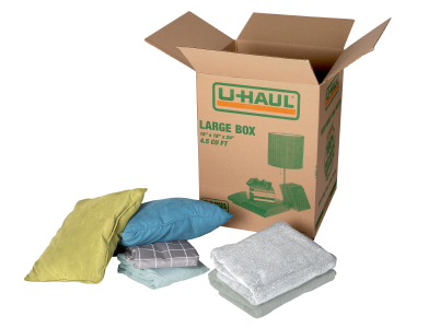Large moving box being packed.