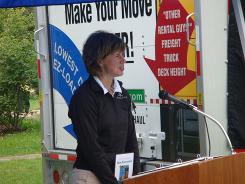 Kelly Cain, director of tourism and events, addresses the crowd on behalf of the city of Moncton.
