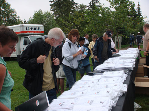 Guests gather their New Brunswick T-shirts and PR kits.