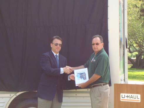 MCP Don Riley presents State Representative Stephen Coaty with his commemorative plaque.