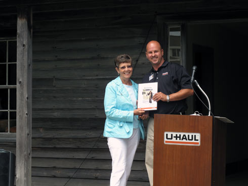 MCP Spelic presents a plaque to Maria Van Bommel, MPP Lambton-Kent-Middlesex.