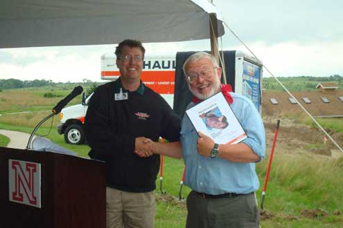 MCP Mike Hale present Mike Voorhies with a commemorative Supergraphic plaque.