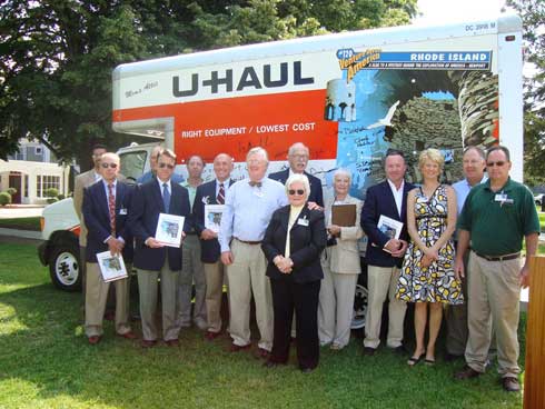 From L-R: Keith Stokes, executive director, Newport County Chamber of Commerce; David Mathias, chief operating officer, Newport Restoration Foundation; Stephen Coaty, state representative; Bert Lippincott, reference librarian, Newport Historical Society; Edward Lavallee, Newport city manager; Jonathan Stephens, director of Economic Development; William Penhallow, professor emeritus of physics, University of Rhode Island; Cheryl Helms, library director, Redwood Library; Jan Barstad, president, Chronognostic Research Foundation; Stephen Coyne, city councilor, Kathryn Farrington, vice president of marketing, Newport Convention and Visitors Bureau; Evan Smith, CEO, Newport Convention and Visitors Bureau; and Don Riley, MCP, U-Haul Company of Rhode Island