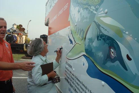Mayor Sullivan signing the truck.