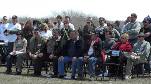 The dignitaries and crowd listen as Jack Dubois, director of Manitoba Wildlife and Ecosystem Protection Branch, talks about the partnership between U-Haul and Manitoba Conservation.