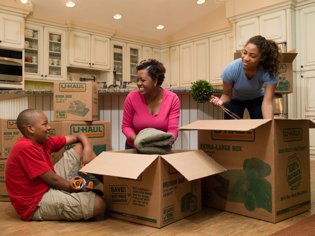 Family packing with moving boxes