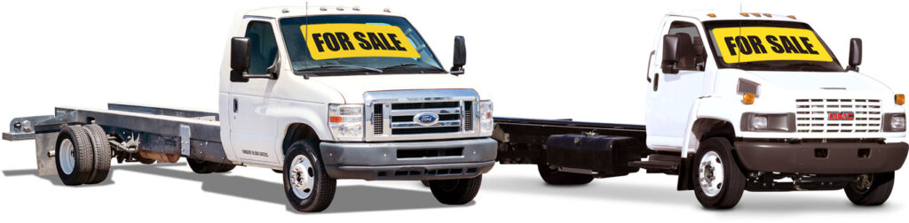 Two Chassis available for sale by U-Haul Truck Sales. A GMC and a Ford.
