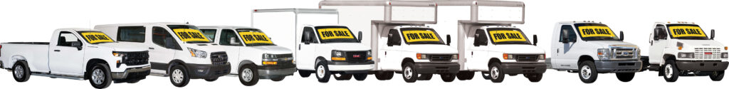 An assort of vehicles from the U-Haul fleet with For Sale signs on the front windows. U-Haul Fleet Sales has U-Haul Trucks and Chassis available for sale.